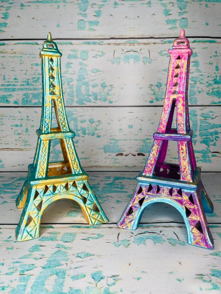 2 eiffel towers painted in spring colors