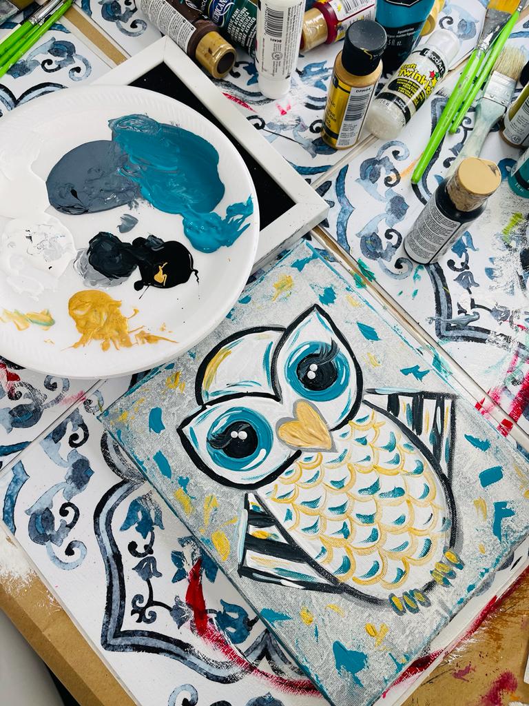 blue and gold owl painting