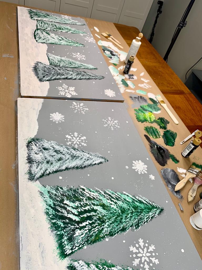table with snowy Christmas tree art