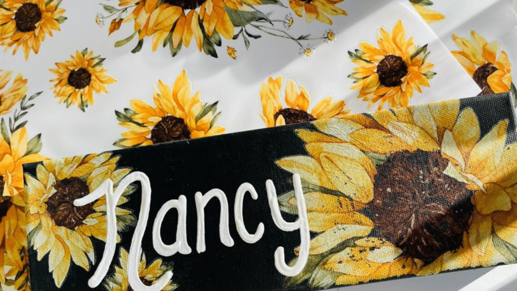 Black canvas with sunflowers on it 